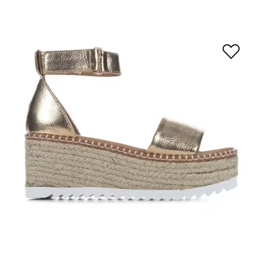 Y-Not Tuckin Platform Wedges in a metallic light gold finish.Size 6.5